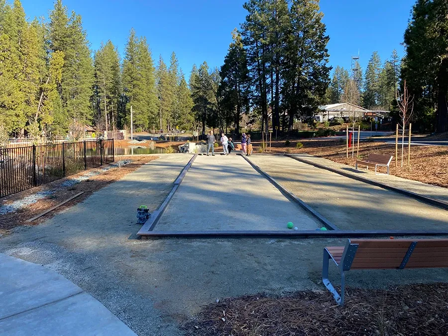 Group gathered around the bocce court at Grass Valley RV Resort