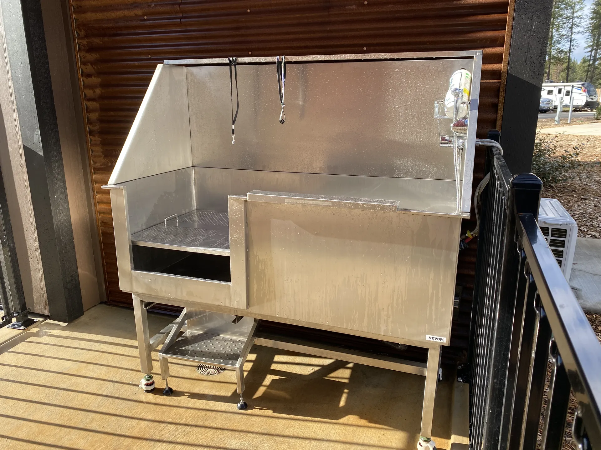 Dog wash station on the covered porch at Grass Valley RV Resort