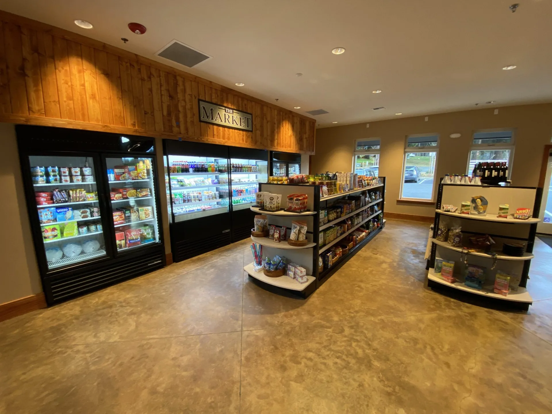 Wide view of The Market's coolers and shelves inside the lodge at Grass Valley RV Resort