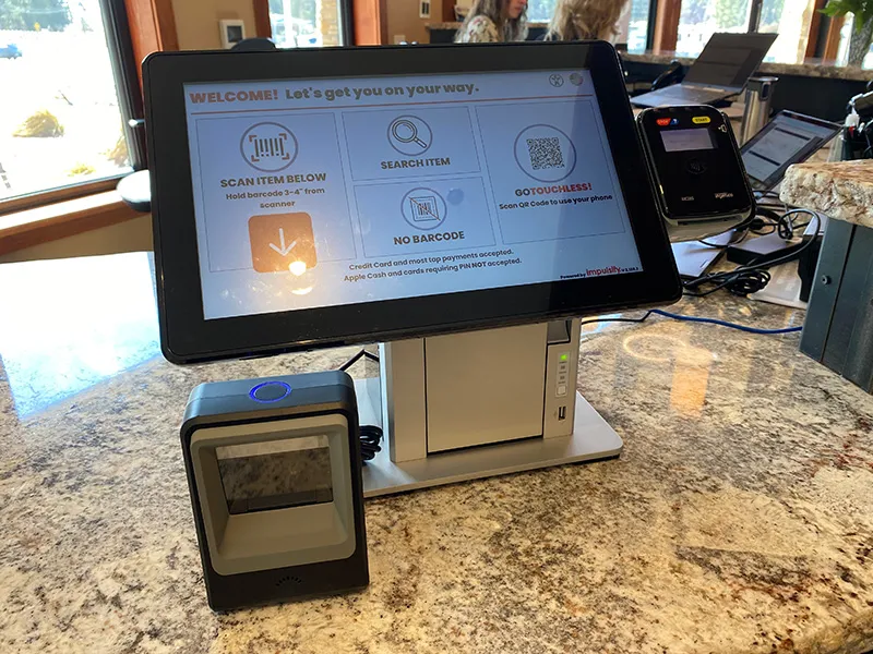 Digital self-checkout kiosk inside The Market at Grass Valley RV Resort