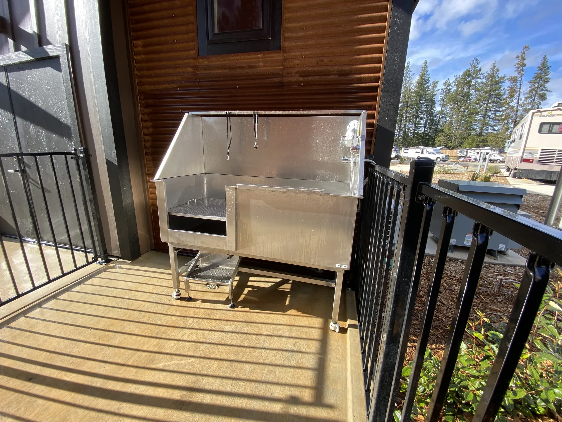 Raised stainless dog wash tub with sprayer at Grass Valley RV Resort