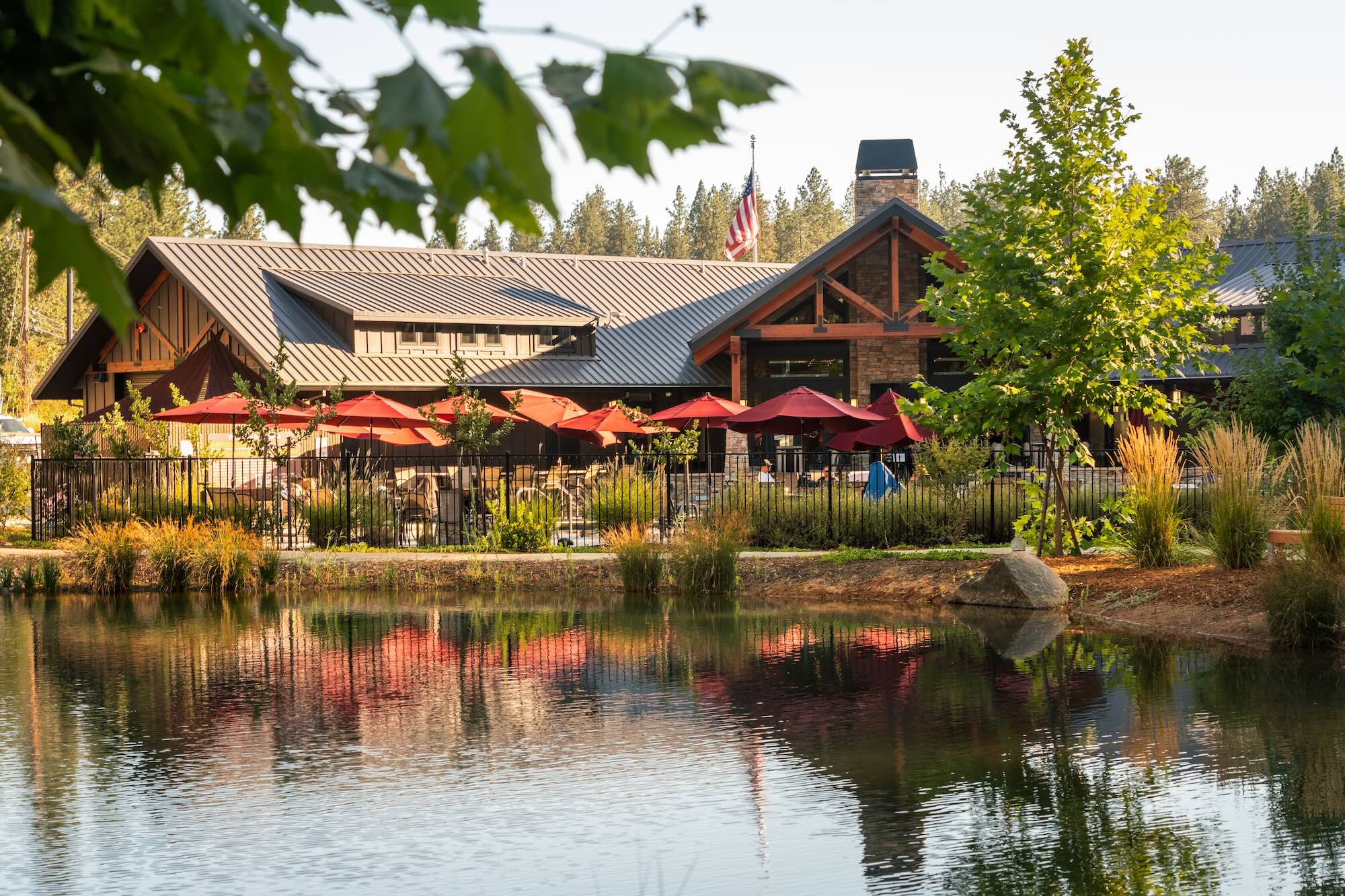 Grass Valley RV Resort lodge reflected in the pond
